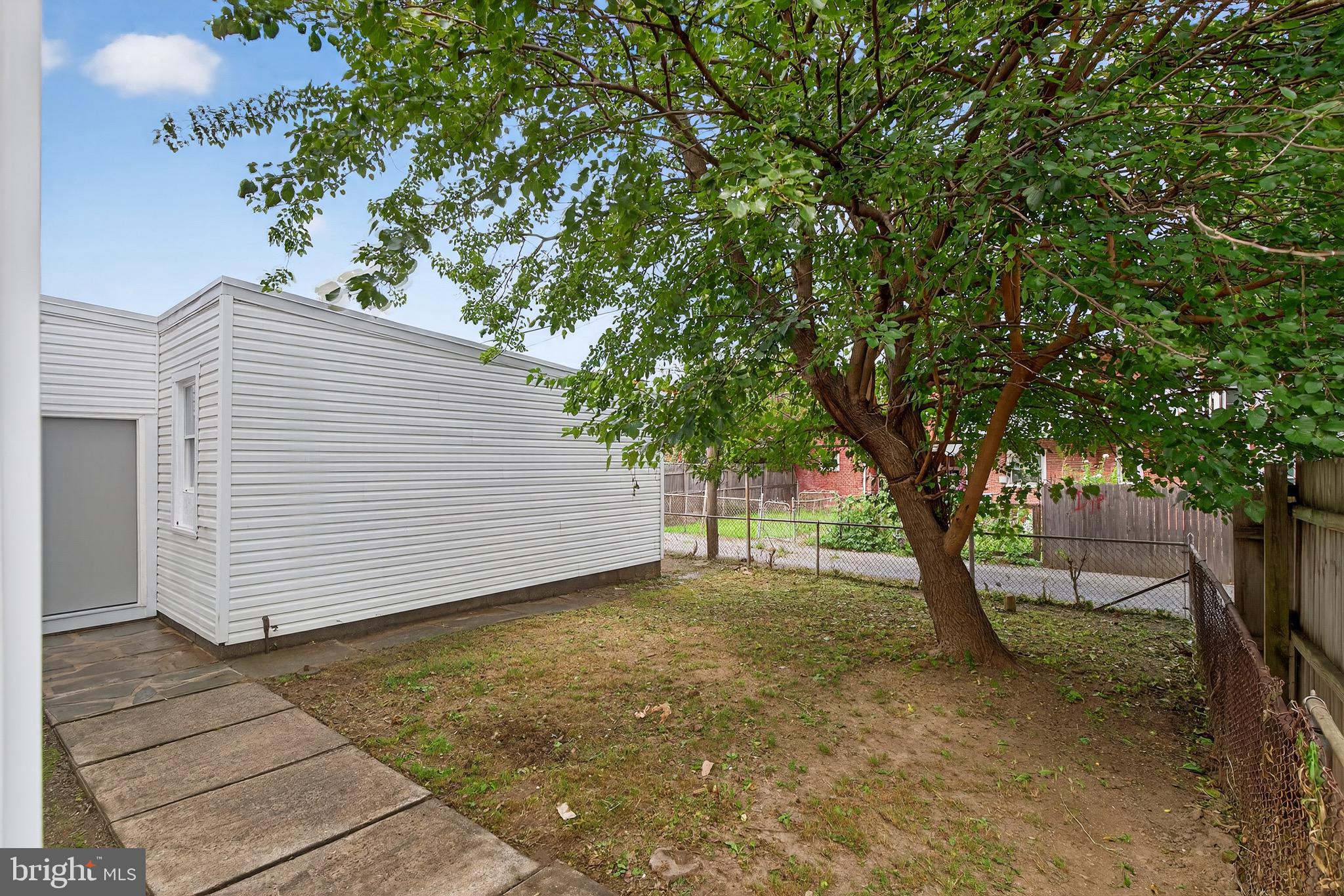 623 East Chestnut Street Lancaster, PA 17602 - Photo 49 of 58 a view of a yard with a tree