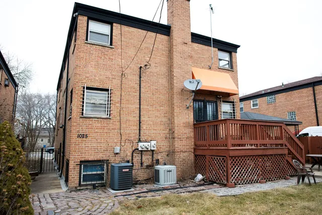 a front view of a house with roof deck