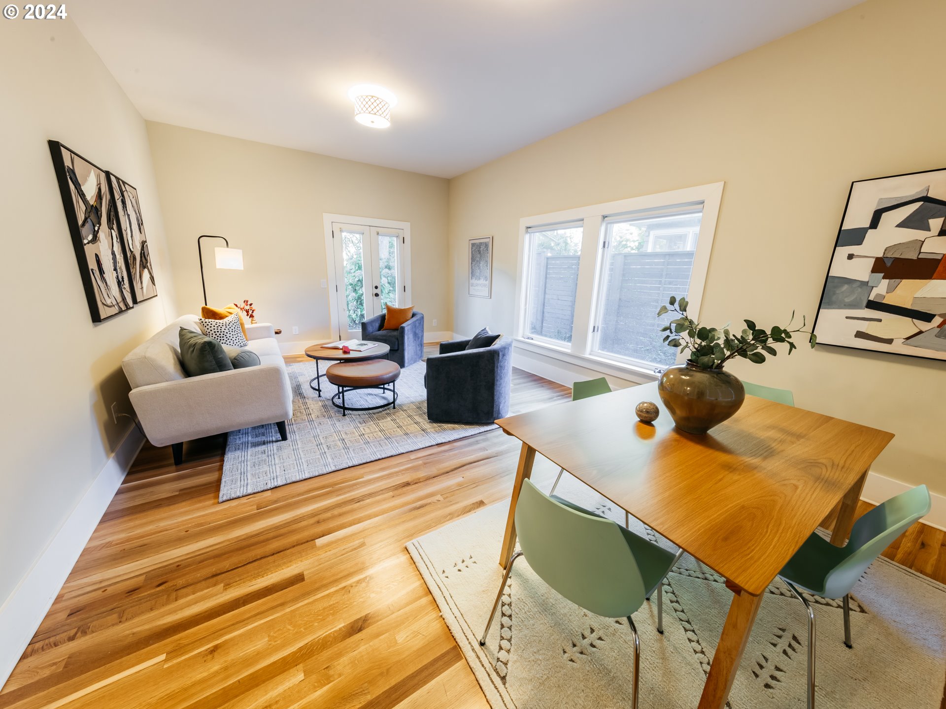 3117 Southeast Brooklyn Street Portland, OR 97202 - Photo 12 of 39 a living room with furniture and wooden floor