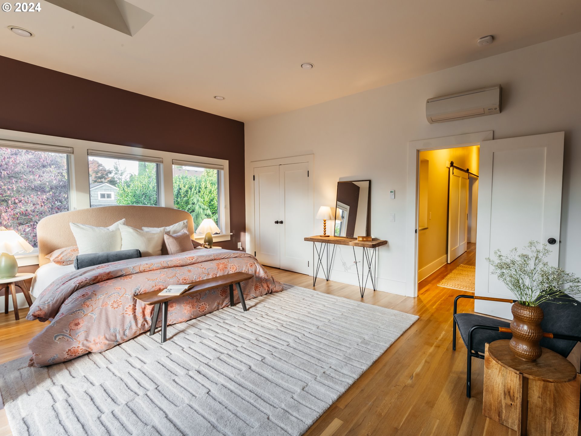 3117 Southeast Brooklyn Street Portland, OR 97202 - Photo 26 of 39 a bed room with a bed and a large window