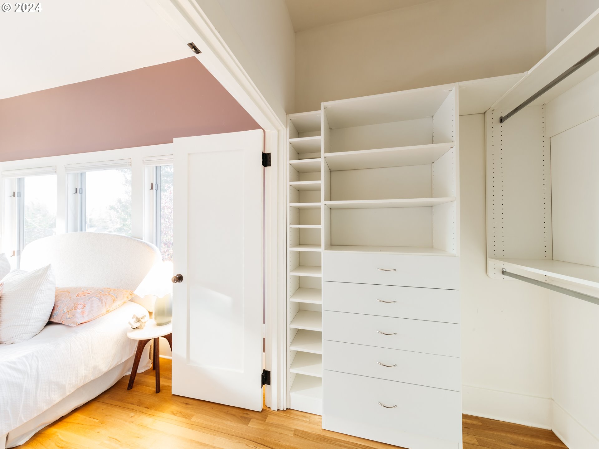 3117 Southeast Brooklyn Street Portland, OR 97202 - Photo 28 of 39 a view of walk in closet with empty racks