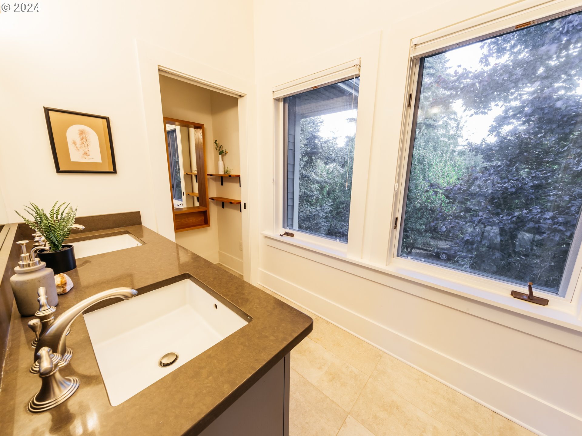 3117 Southeast Brooklyn Street Portland, OR 97202 - Photo 29 of 39 a living room with a couch and a floor to ceiling window