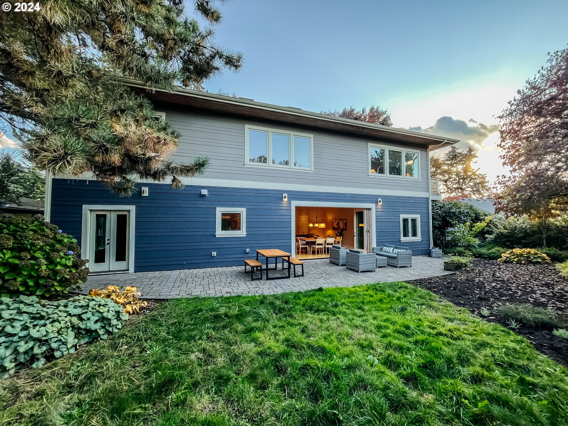 3117 Southeast Brooklyn Street Portland, OR 97202 - Photo 35 of 39 a front view of house with yard and seating area