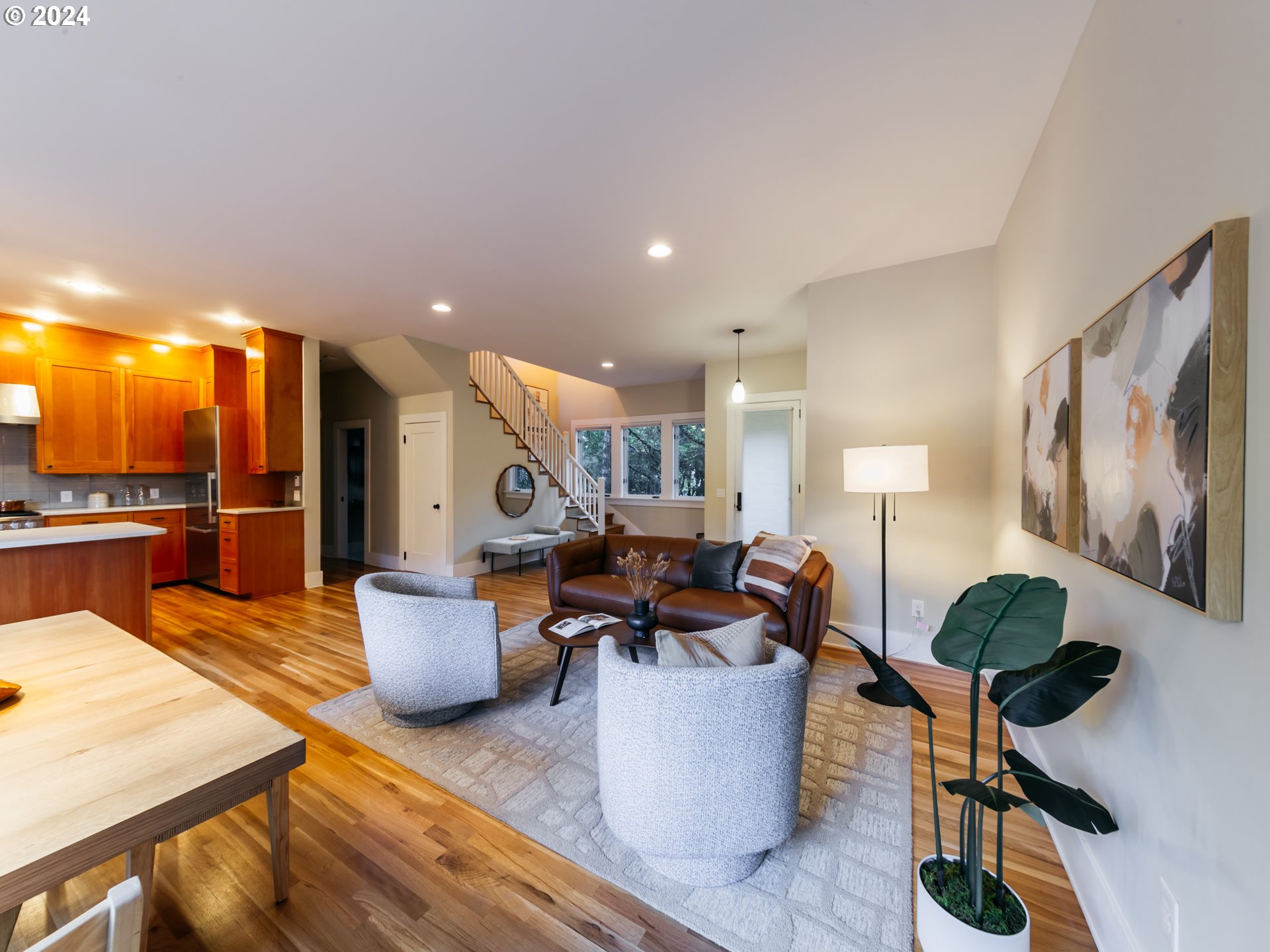 3117 Southeast Brooklyn Street Portland, OR 97202 - Photo 9 of 39 a living room with furniture and wooden floor