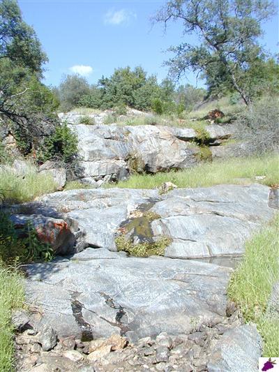 32276 Sycamore Road Tollhouse, CA 93667 - Photo 5 of 12 Seasonal waterfall on the property. A short walk from the house.