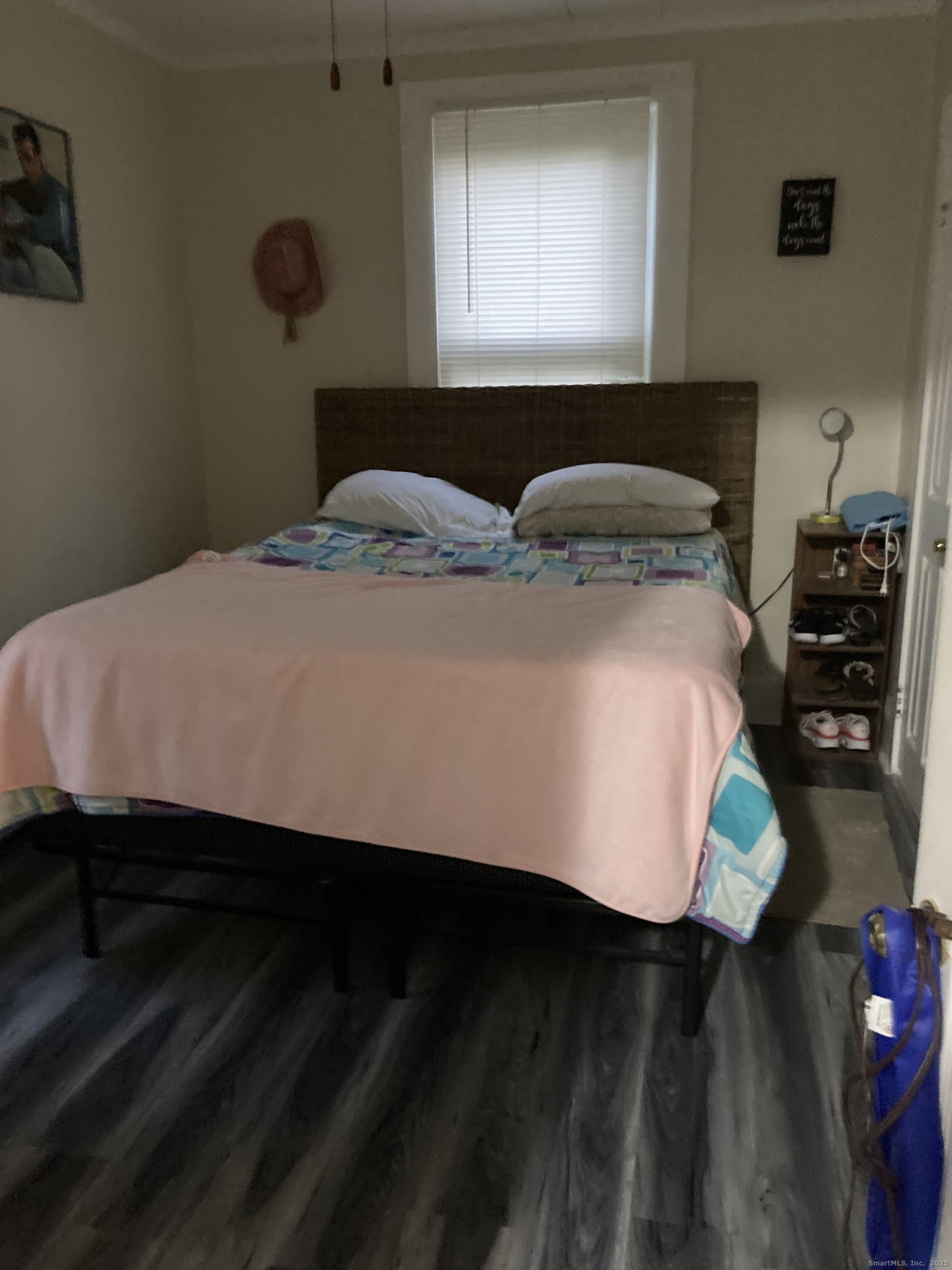 231 Poquonnock Road Groton, CT 06340 - Photo 11 of 23 a bedroom with a bed and a potted plant on dresser