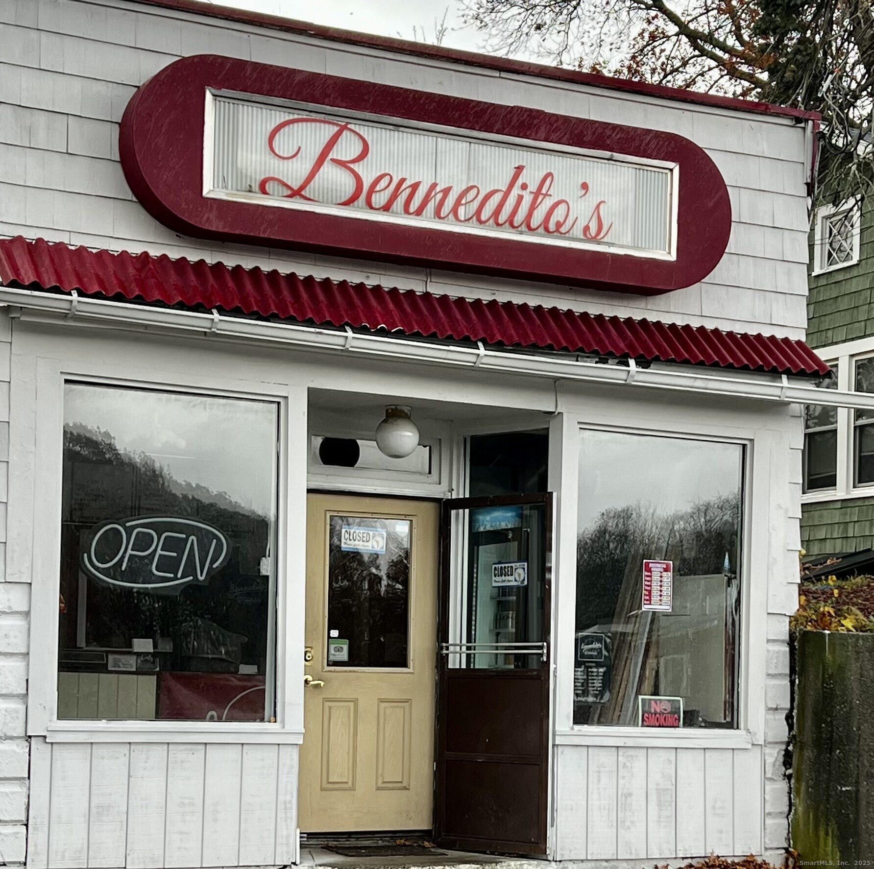 231 Poquonnock Road Groton, CT 06340 - Photo 19 of 23 a sign on the side of a building