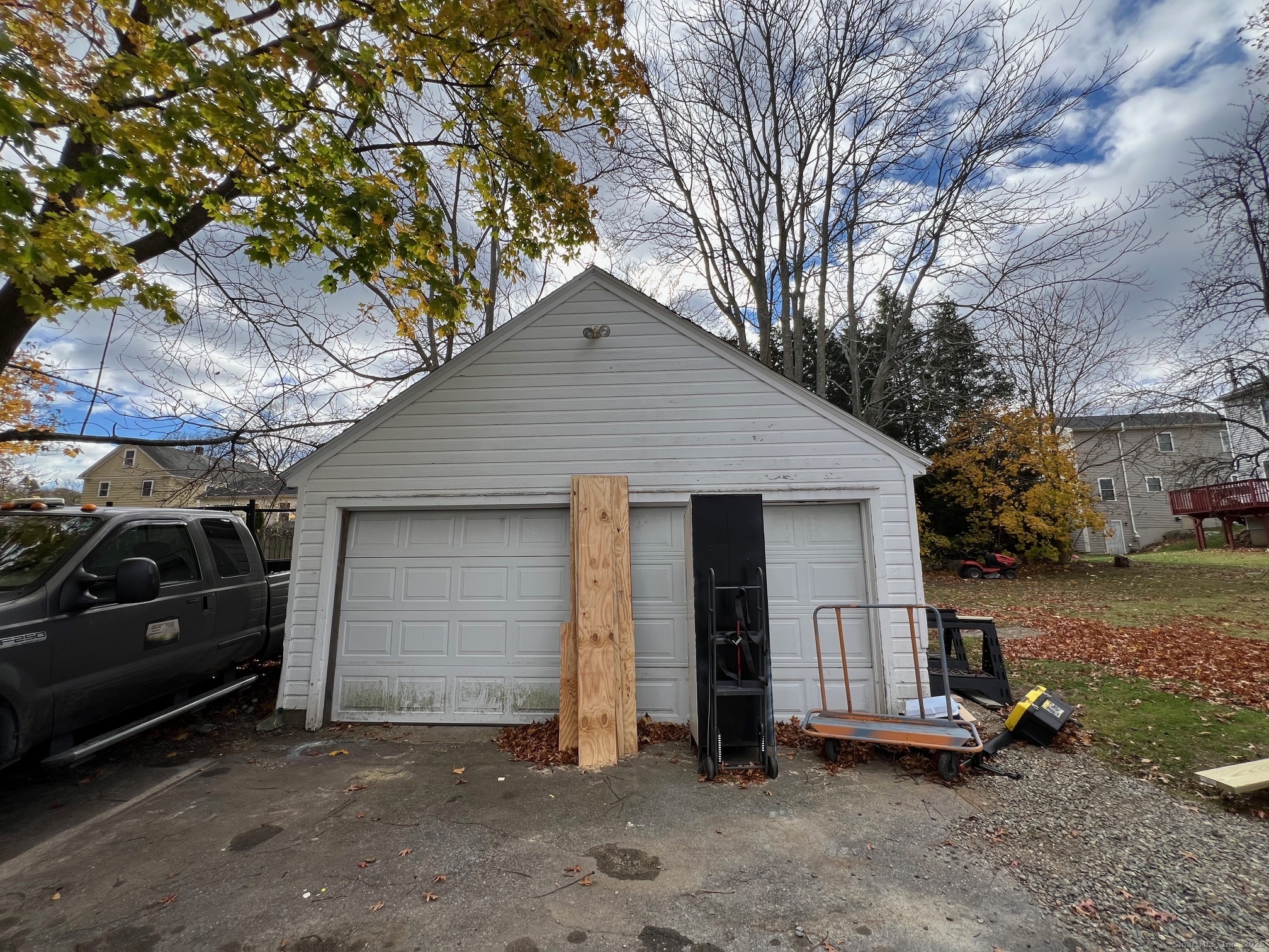 231 Poquonnock Road Groton, CT 06340 - Photo 2 of 23 a view of a car in front of house