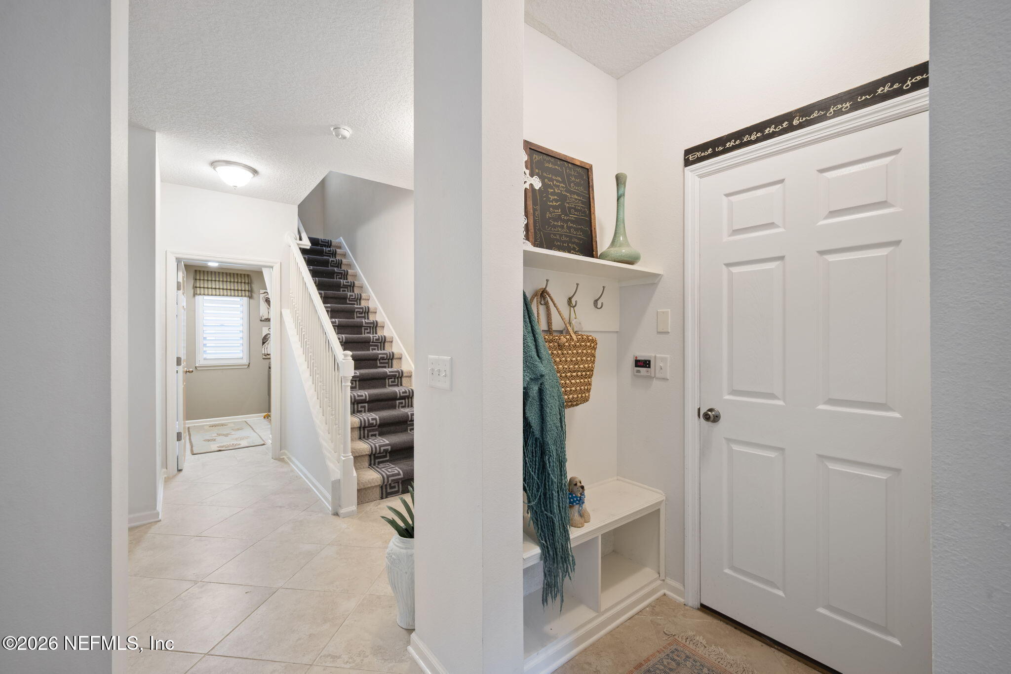 26 Olivette Street St. Johns, FL 32259 - Photo 12 of 42 a view of a hallway with wooden floor and entryway