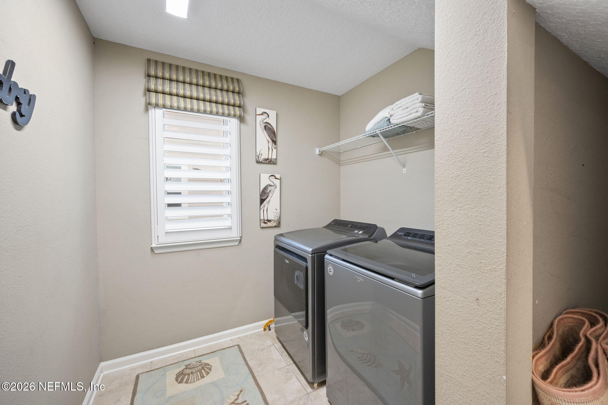 26 Olivette Street St. Johns, FL 32259 - Photo 13 of 42 a utility room with dryer and washer