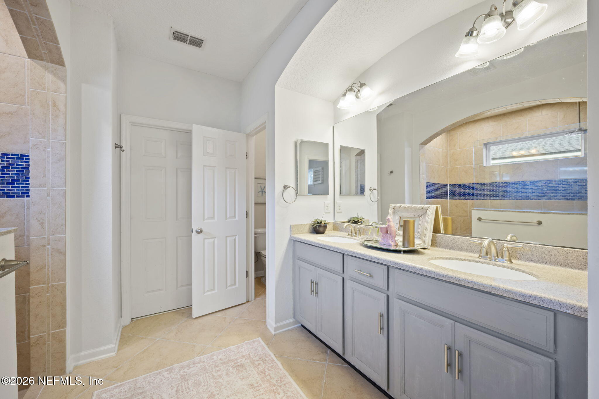 26 Olivette Street St. Johns, FL 32259 - Photo 18 of 42 a spacious bathroom with double sink and a mirror