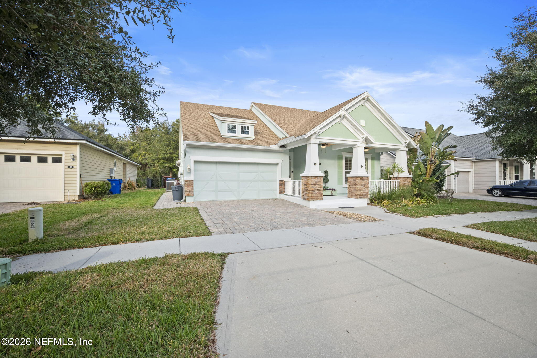 26 Olivette Street St. Johns, FL 32259 - Photo 2 of 42 a front view of a house with a yard