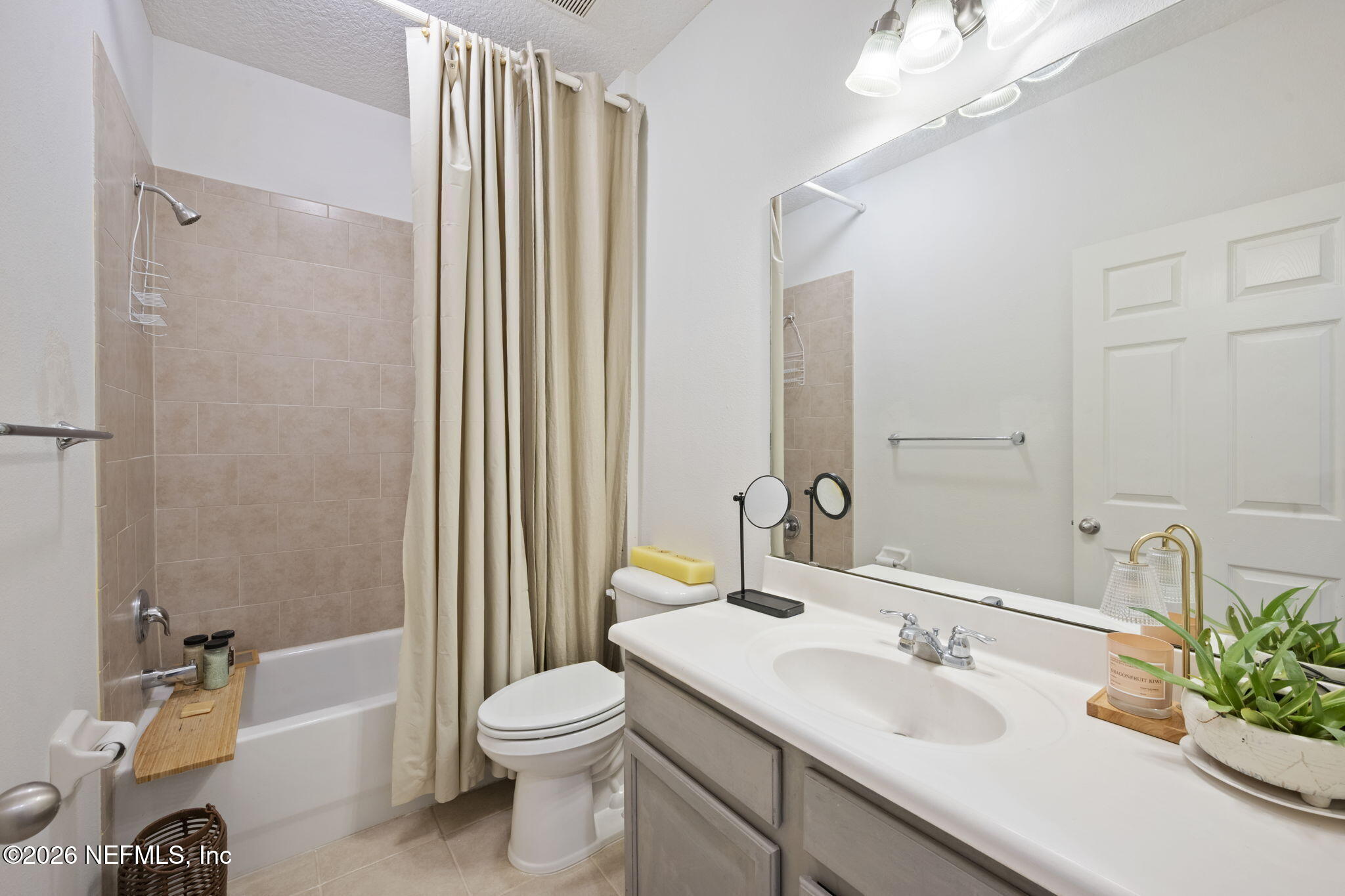 26 Olivette Street St. Johns, FL 32259 - Photo 21 of 42 a bathroom with a granite countertop sink a toilet and shower