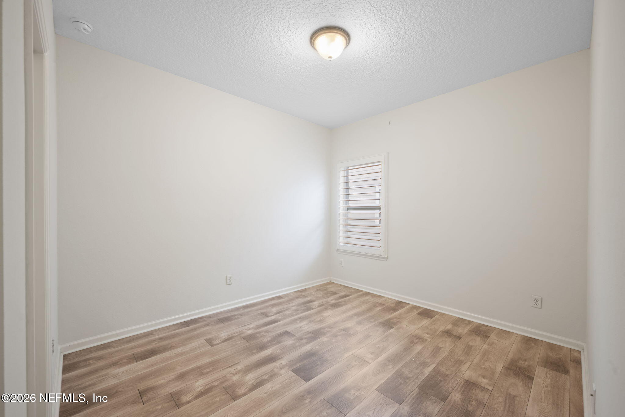 26 Olivette Street St. Johns, FL 32259 - Photo 22 of 42 a view of an empty room with a window