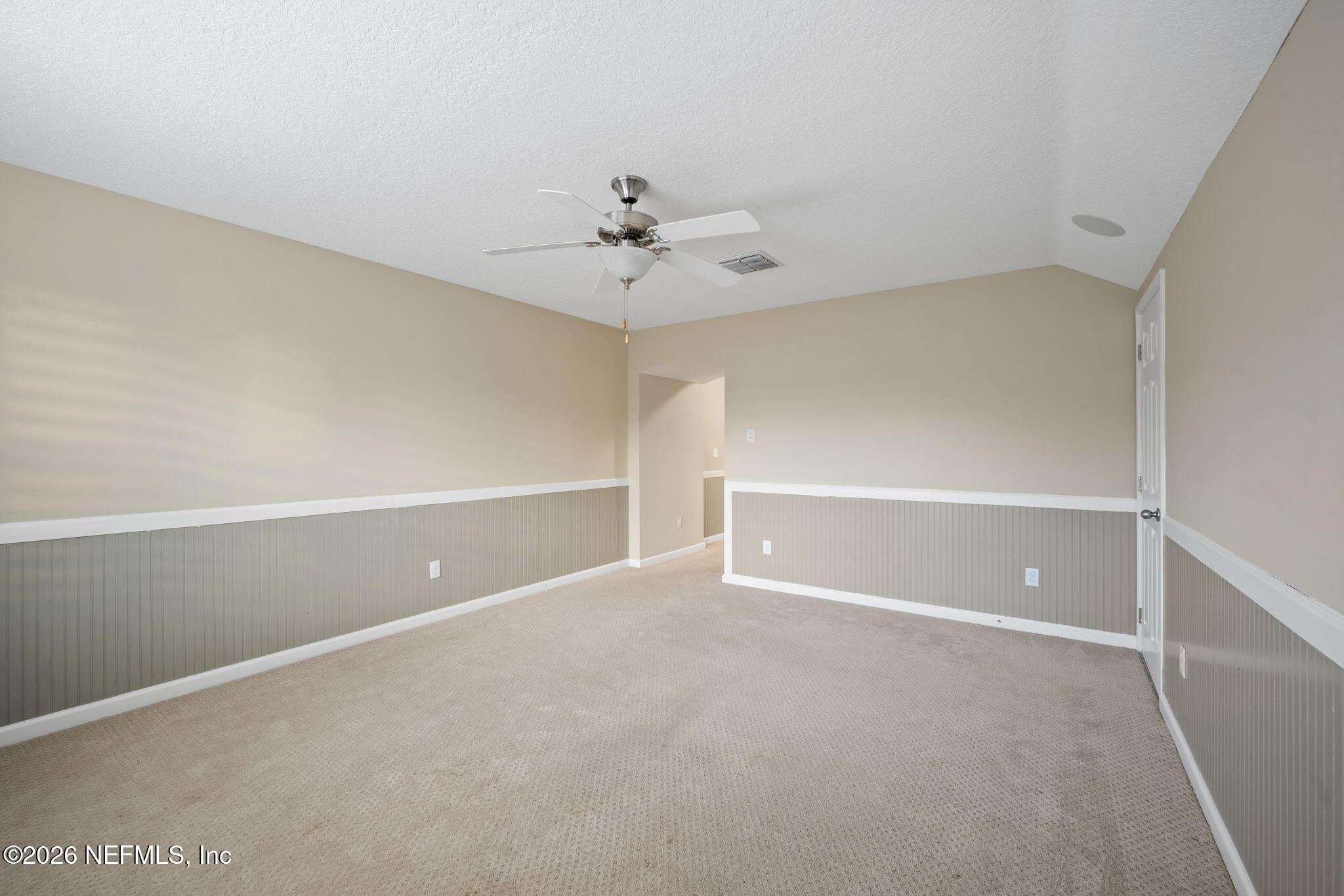26 Olivette Street St. Johns, FL 32259 - Photo 25 of 42 a view of an empty room with a ceiling fan