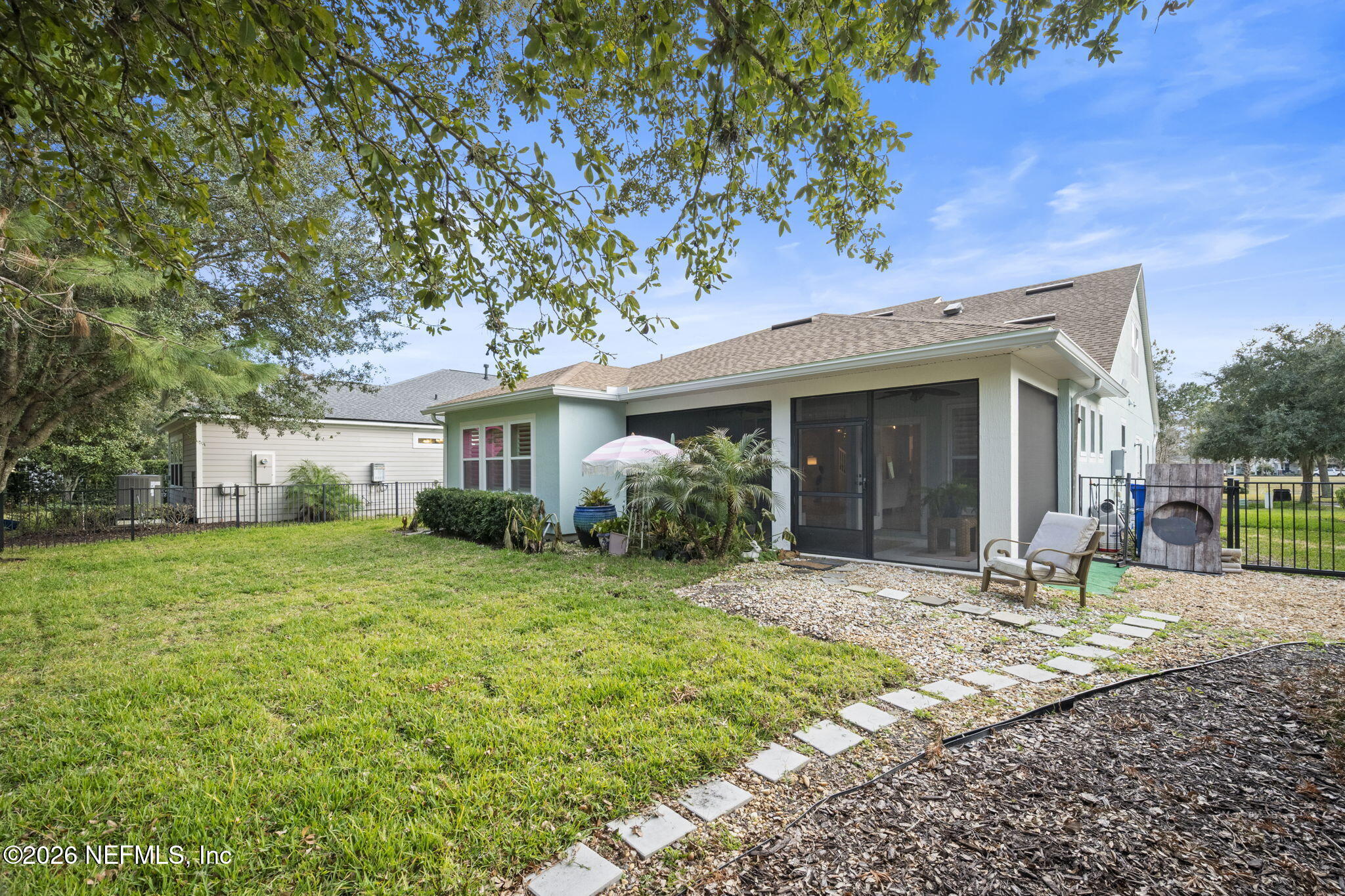 26 Olivette Street St. Johns, FL 32259 - Photo 31 of 42 a front view of a house with garden