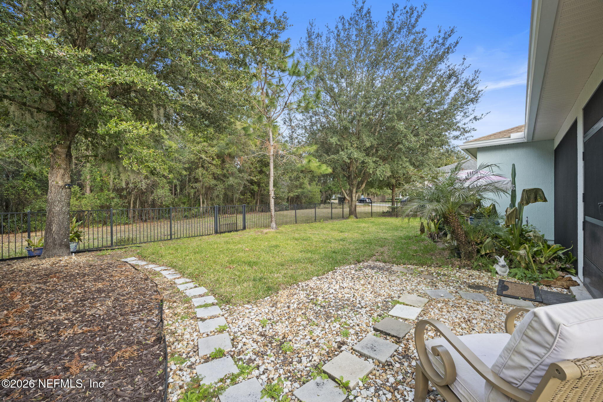 26 Olivette Street St. Johns, FL 32259 - Photo 33 of 42 a backyard of a house with lots of green space