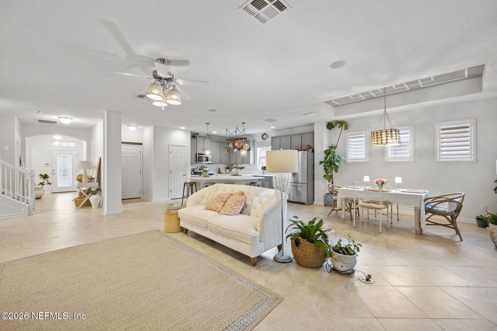 26 Olivette Street St. Johns, FL 32259 - Photo 6 of 42 a bed room with furniture and a chandelier