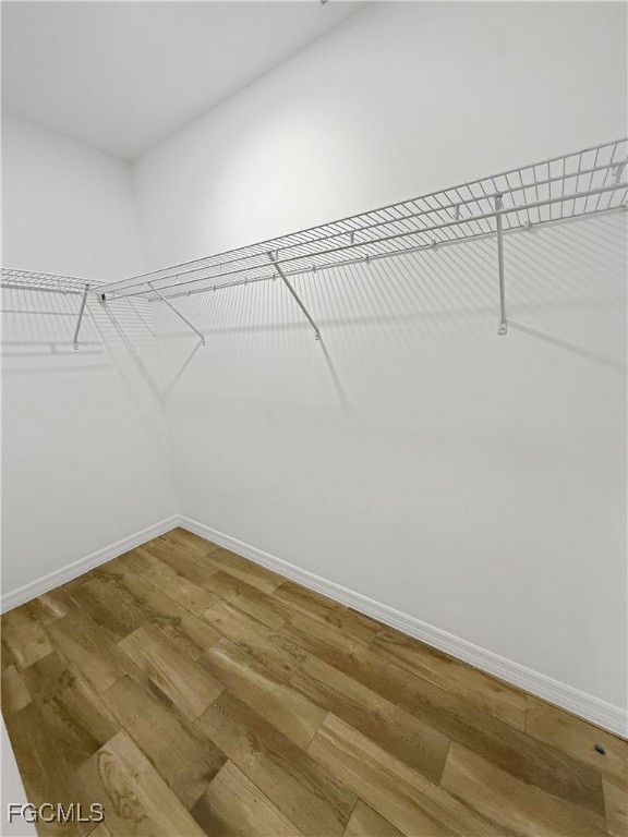 8157 Albatross Road Fort Myers, FL 33967 - Photo 20 of 24 a view of a room with racks on the wall