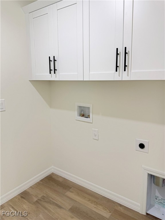 8157 Albatross Road Fort Myers, FL 33967 - Photo 6 of 24 a view of cabinets and wooden floor