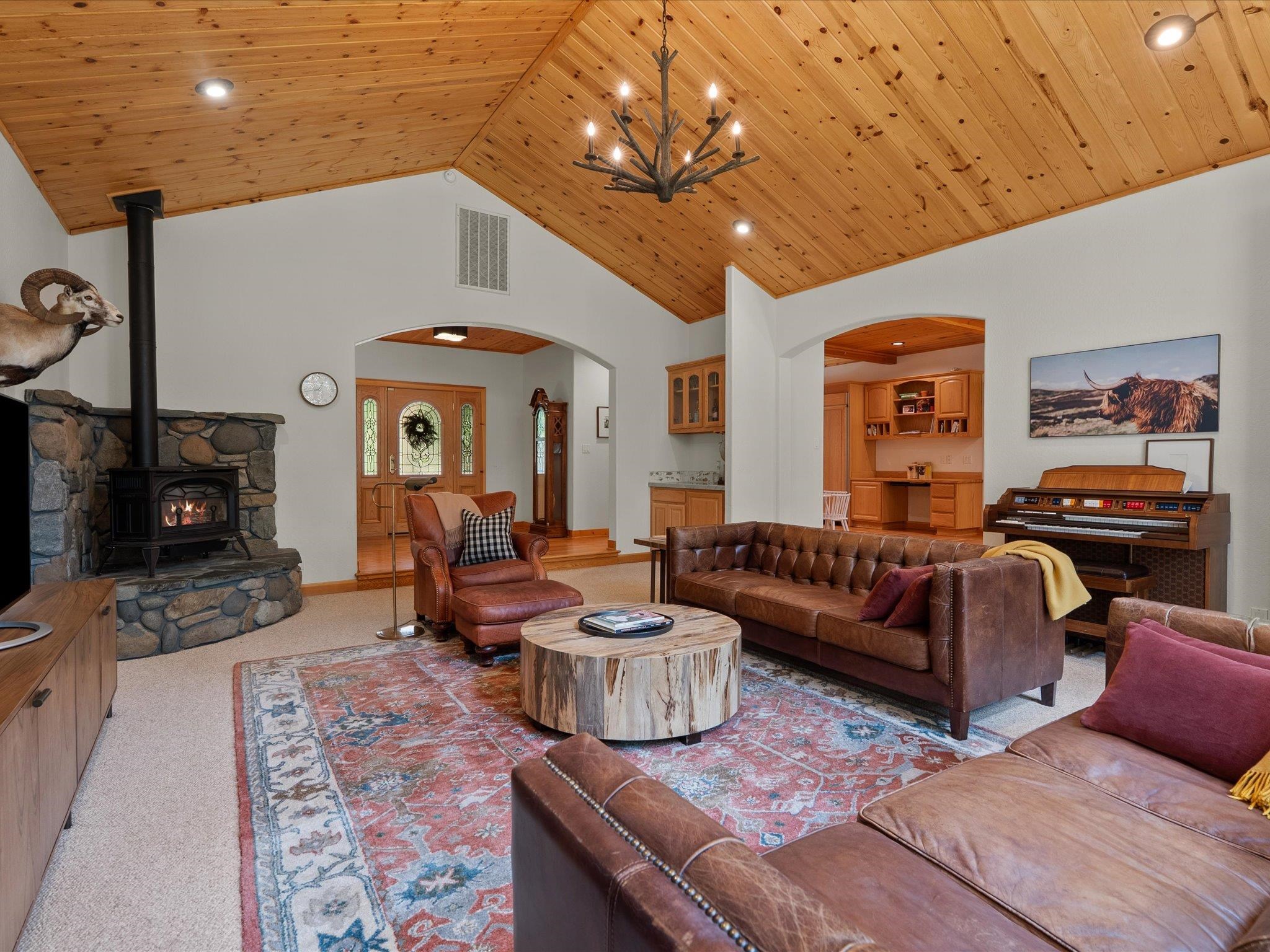 355 Quail View Circle Clio, CA 96106 - Photo 14 of 48 a living room with furniture and a fireplace