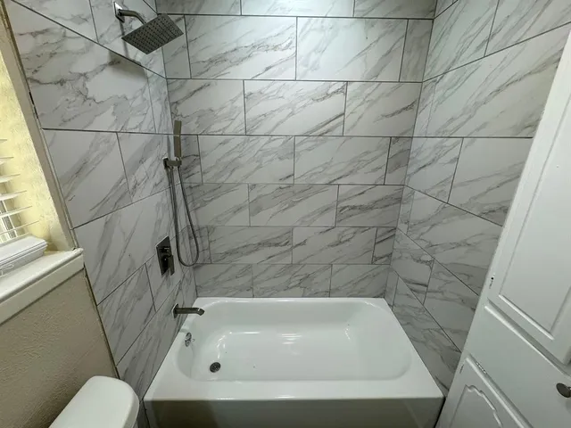 a bathroom with a tub