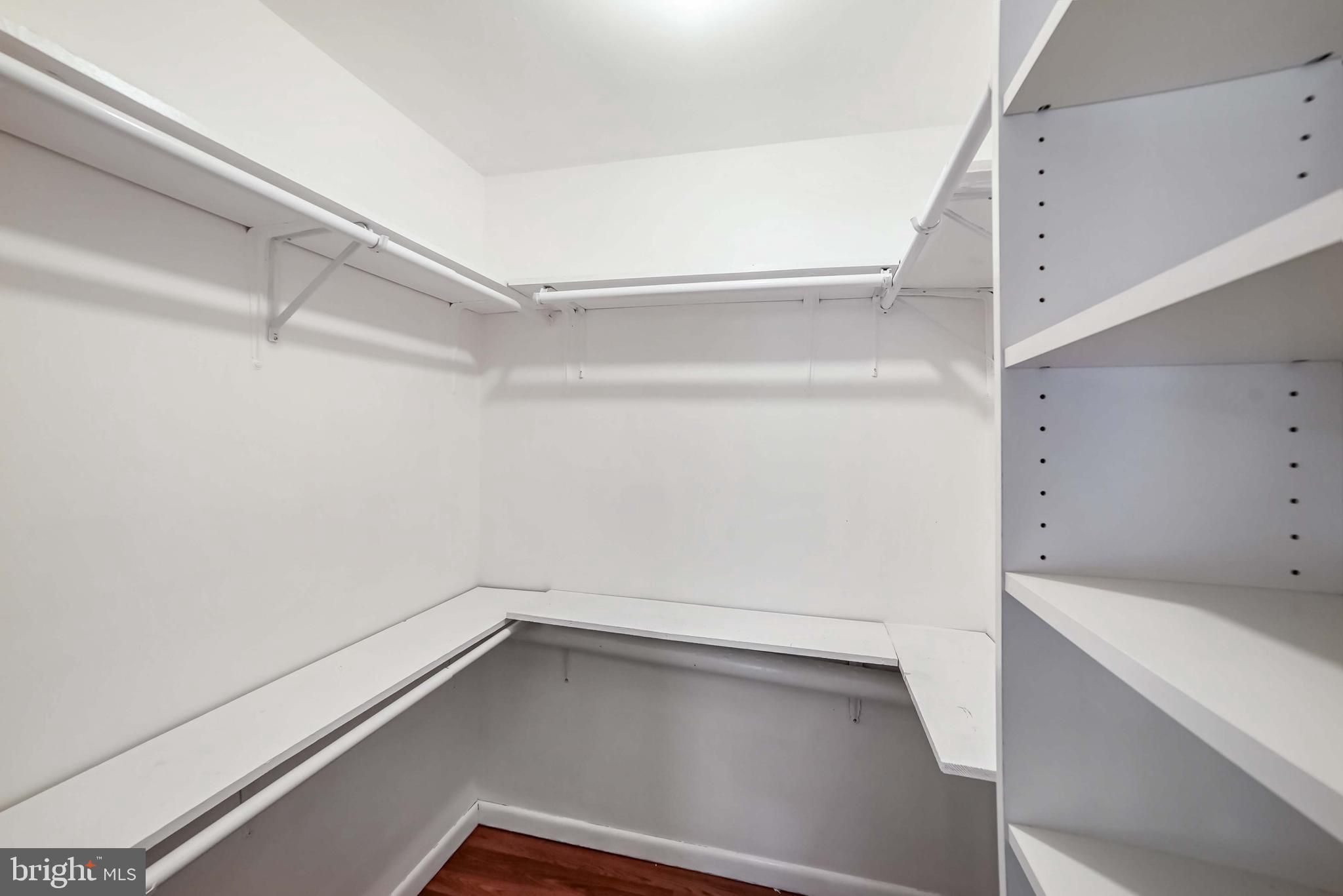 9551 Saddlebag Row Columbia, MD 21045 - Photo 26 of 30 a view of an empty walk in closet