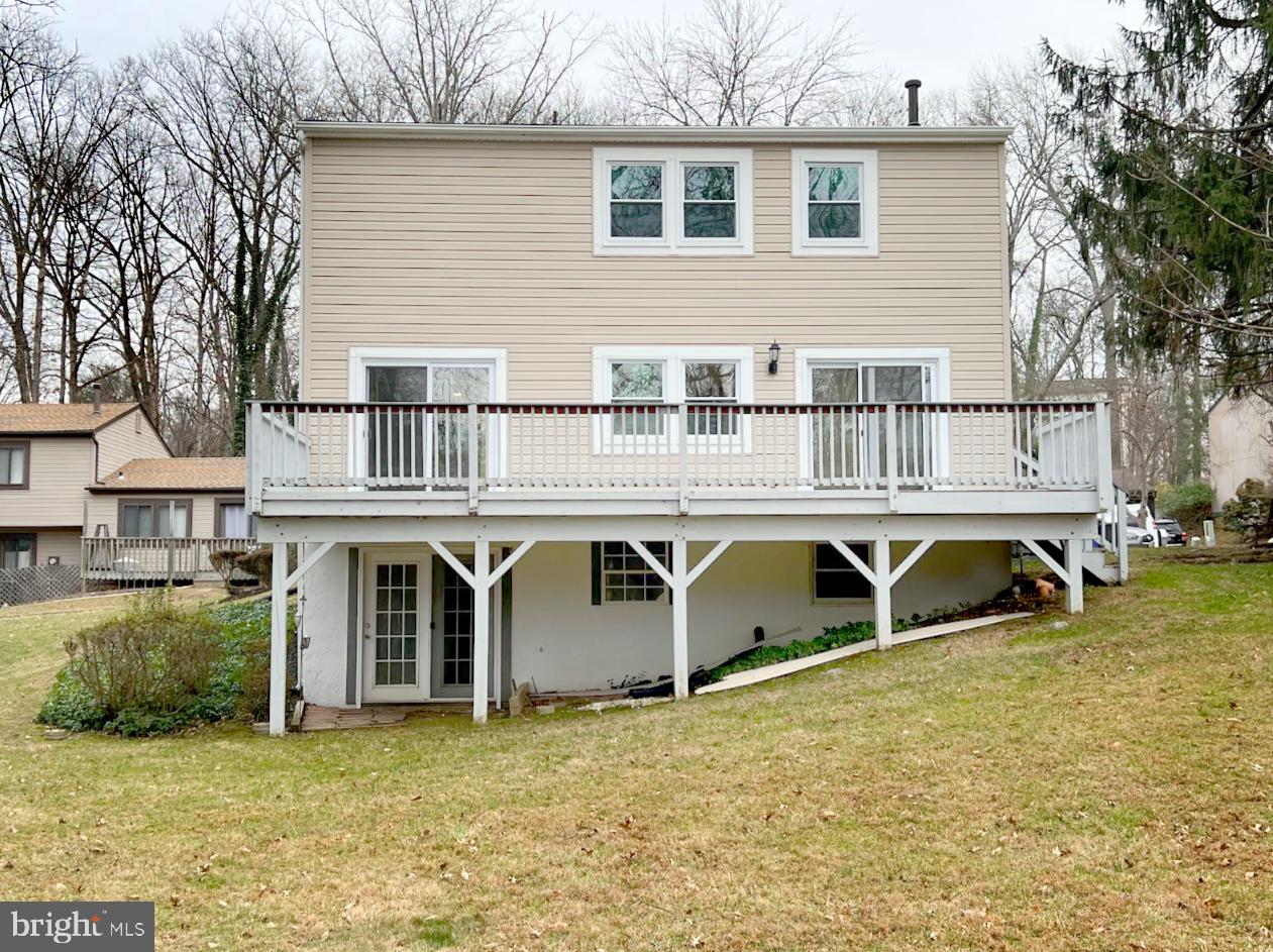 9551 Saddlebag Row Columbia, MD 21045 - Photo 28 of 30 a view of a house with a yard and sitting area