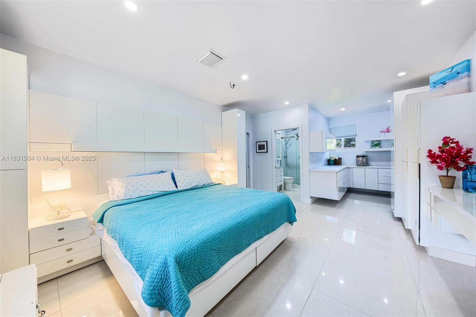 9720 Southwest 140th Street Miami, FL 33176 - Photo 19 of 24 a bedroom with a bed and a large window