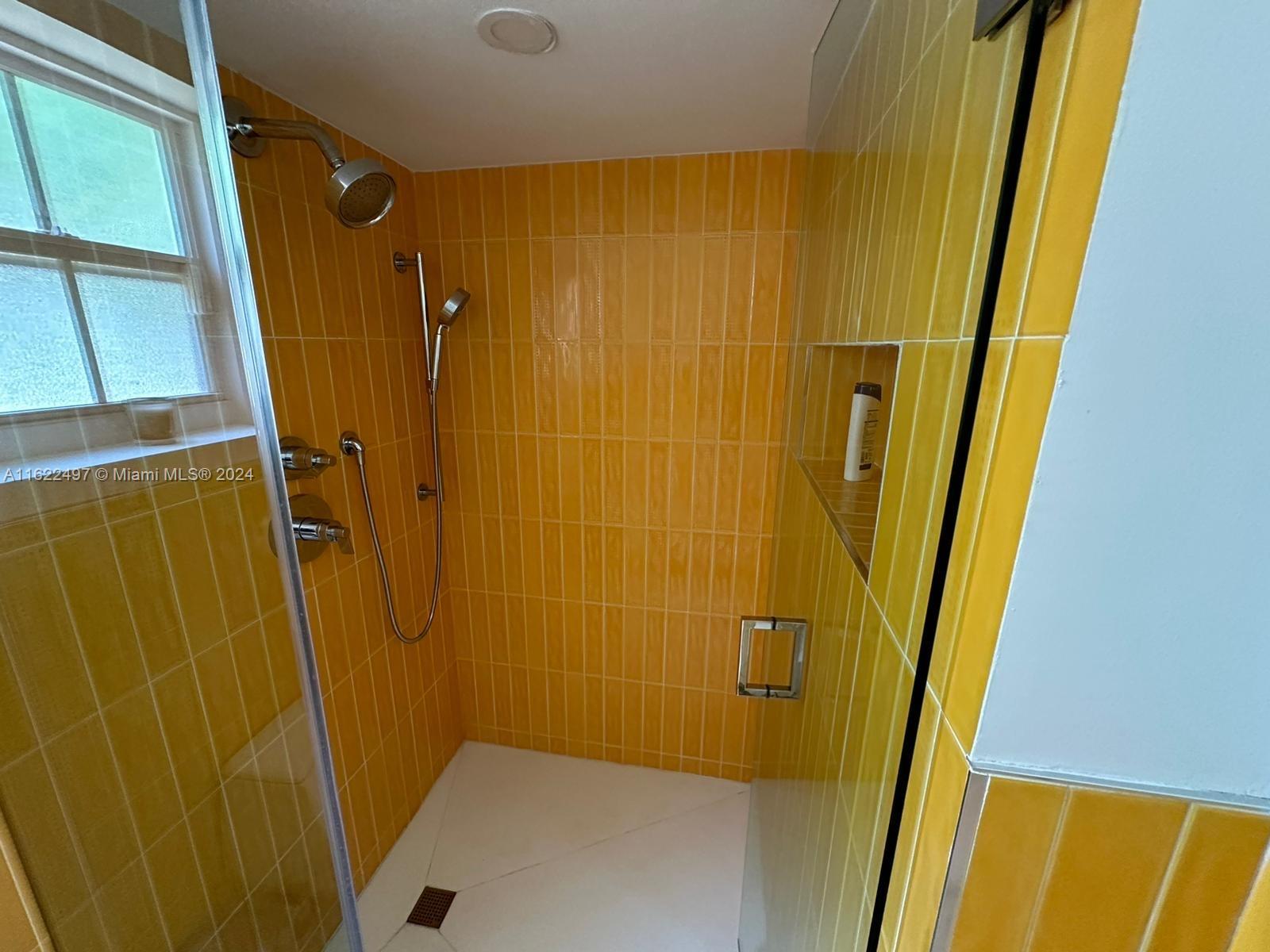 5301 Alton Road Miami Beach, FL 33140 - Photo 27 of 46 a bathroom with a tub