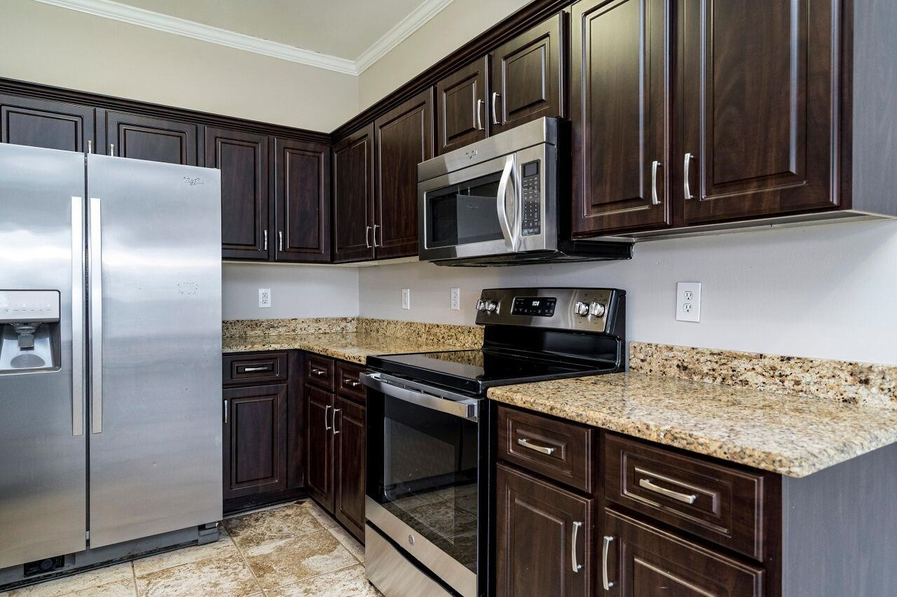 600 Three Meadows Road Fuquay-Varina, NC 27526 - Photo 11 of 30 The kitchen has stainless appliances which convey with the sale of this home. Kitchen