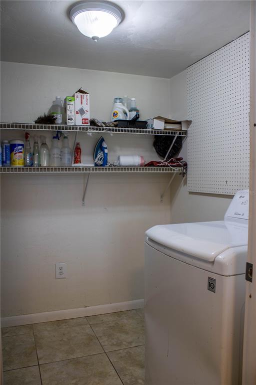 1836 North Crystal Lake Drive, Unit 95 Lakeland, FL 33801 - Photo 12 of 31 a view of a room with shelf