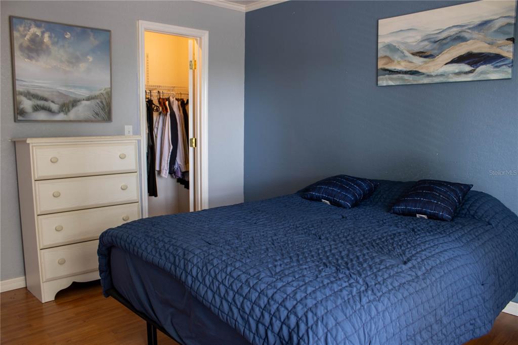 1836 North Crystal Lake Drive, Unit 95 Lakeland, FL 33801 - Photo 19 of 31 a bedroom with a bed and a window