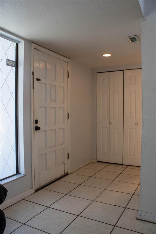 1836 North Crystal Lake Drive, Unit 95 Lakeland, FL 33801 - Photo 2 of 31 a view of a hallway
