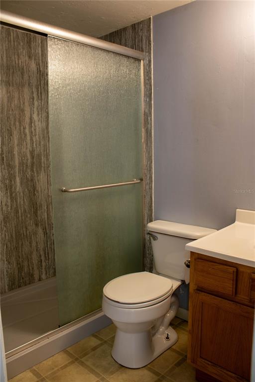 1836 North Crystal Lake Drive, Unit 95 Lakeland, FL 33801 - Photo 23 of 31 a white toilet sitting next to a shower