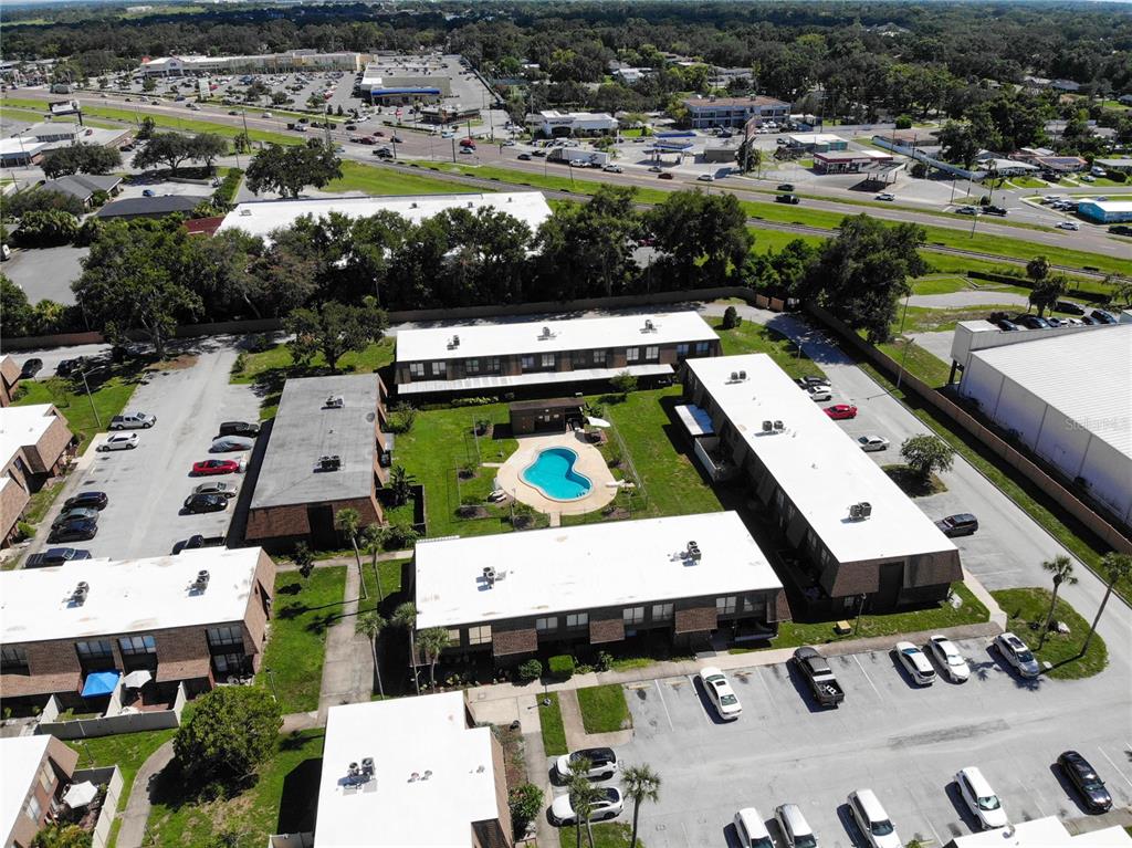 1836 North Crystal Lake Drive, Unit 95 Lakeland, FL 33801 - Photo 28 of 31 an aerial view of residential houses with outdoor space
