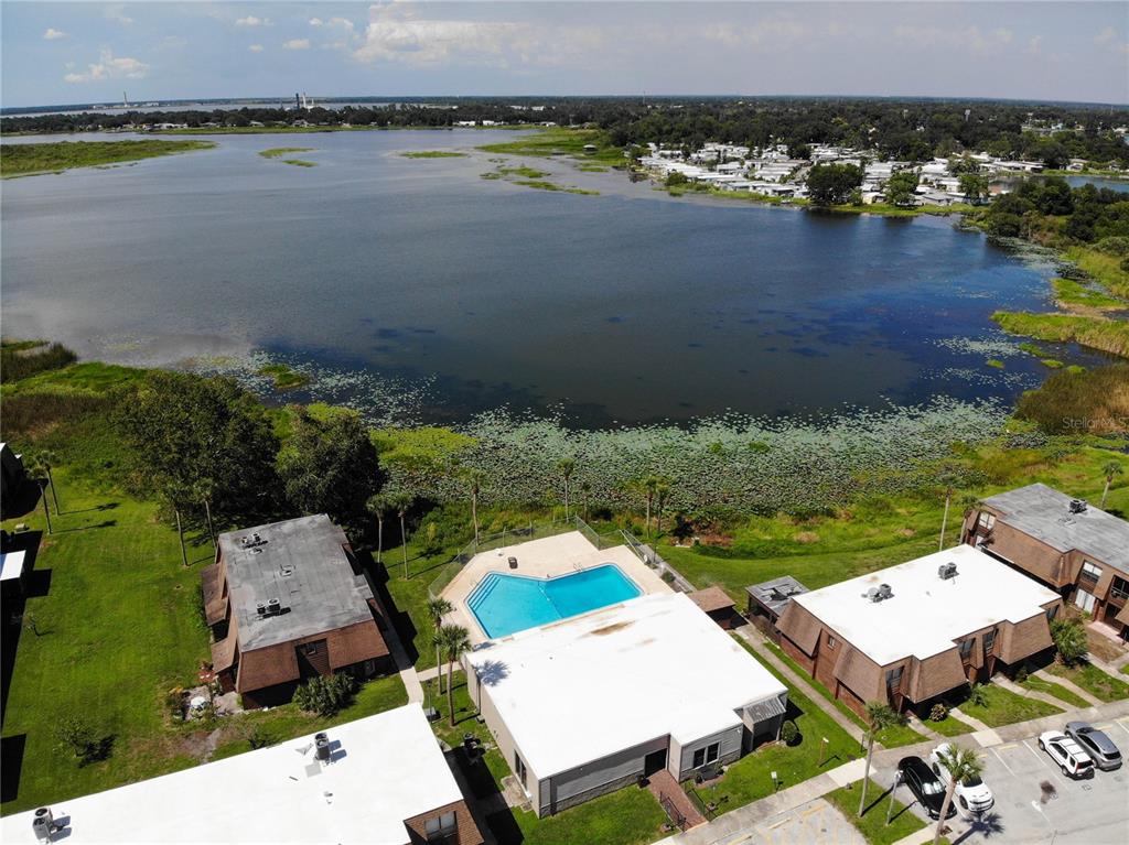 1836 North Crystal Lake Drive, Unit 95 Lakeland, FL 33801 - Photo 30 of 31 an aerial view of a house with a lake view