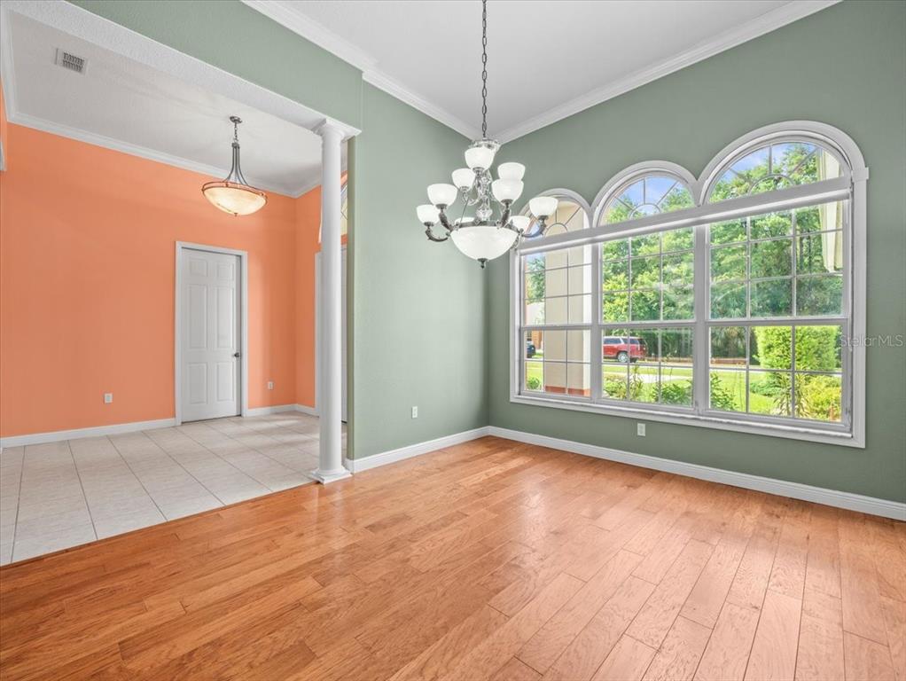 8698 Mississippi Run Weeki Wachee, FL 34613 - Photo 9 of 58 a view of an empty room with a window