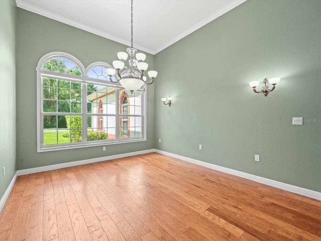 8698 Mississippi Run Weeki Wachee, FL 34613 - Photo 10 of 58 a view of livingroom with window