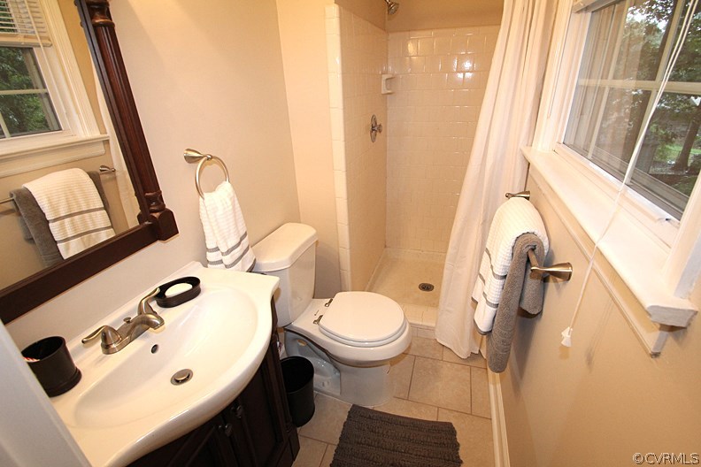 12010 West Petty Road Midlothian, VA 23113 - Photo 14 of 20 a bathroom with a sink and a mirror