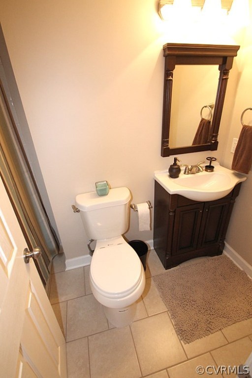 12010 West Petty Road Midlothian, VA 23113 - Photo 15 of 20 a bathroom with a toilet sink and mirror