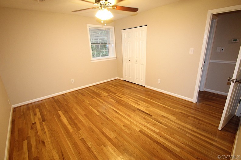 12010 West Petty Road Midlothian, VA 23113 - Photo 8 of 20 a view of an empty room with a window