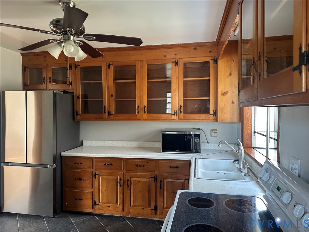 205 Airport Road Mattaponi, VA 23110 - Photo 6 of 15 Kitchen featuring wood finish cabinets, glass fron