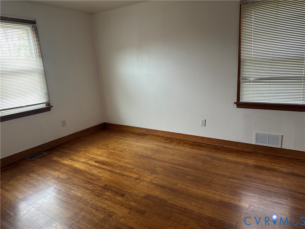 205 Airport Road Mattaponi, VA 23110 - Photo 8 of 15 Unfurnished bedroom featuring hardwood / wood-styl