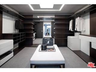 1645 Carla Ridge Beverly Hills, CA 90210 - Photo 15 of 26 a kitchen with a refrigerator and a stove