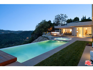 1645 Carla Ridge Beverly Hills, CA 90210 - Photo 21 of 26 a view of a big yard with an outdoor seating