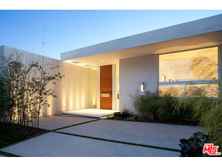 1645 Carla Ridge Beverly Hills, CA 90210 - Photo 24 of 26 a living room with a large window and yard