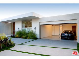 1645 Carla Ridge Beverly Hills, CA 90210 - Photo 26 of 26 a view of garage with a car parked in it