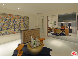 1645 Carla Ridge Beverly Hills, CA 90210 - Photo 10 of 26 a living room with furniture