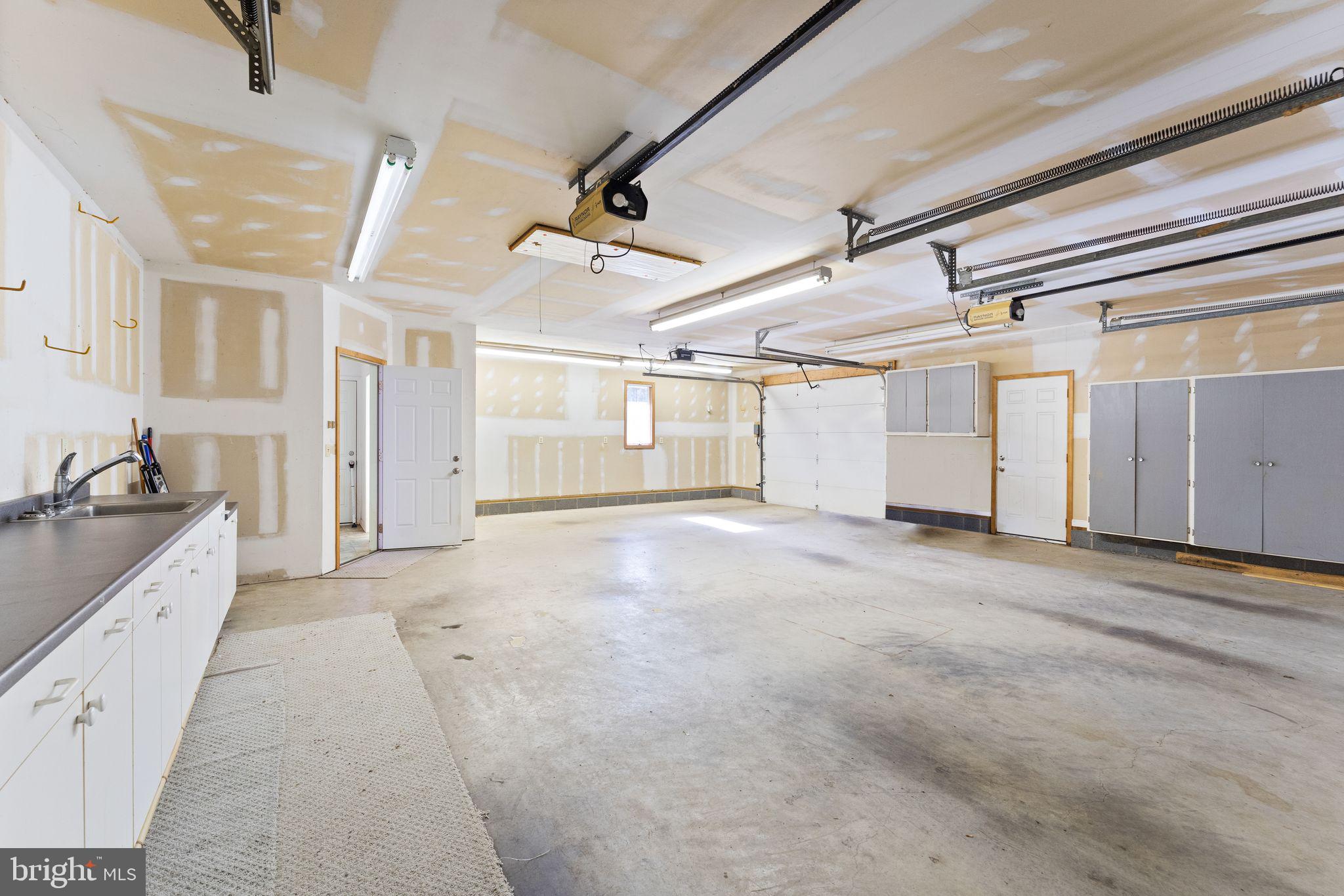 7905 Guy Drive Manassas, VA 20111 - Photo 58 of 78 Oversized 3 car front and side load garage